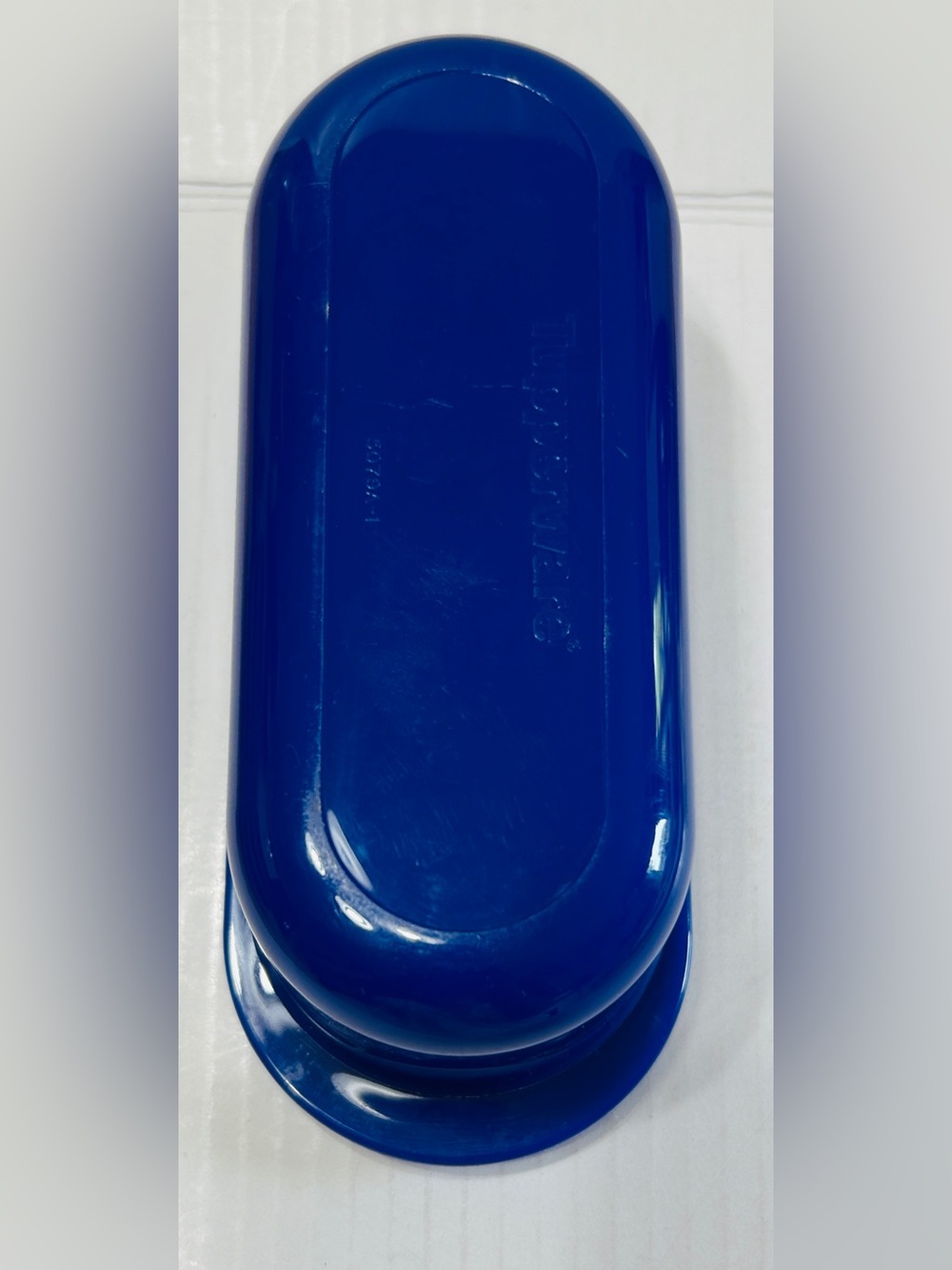 Tupperware impressions butter dish, navy blue, holds 1 stick of butter. NEW.